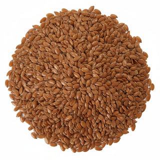 Close-up of a pile of flaxseeds on a white background