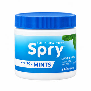 Container of Spry peppermints with xylitol on white background
