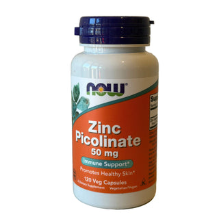 Supplement bottle labeled 'Zinc Picolinate' on a light-colored surface